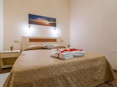 Letto o letti in una camera di Il Borgo