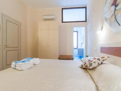 Letto o letti in una camera di Il Borgo