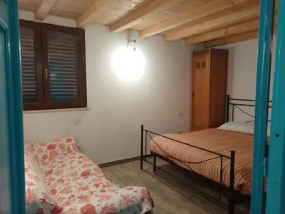 Letto o letti in una camera di Casa in campagna