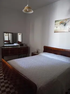 Letto o letti in una camera di Is Brebus