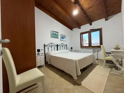 Letto o letti in una camera di Costa gentile