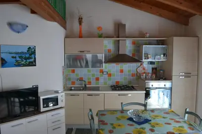 Cucina o angolo cottura di Casa del Tramonto Pistis