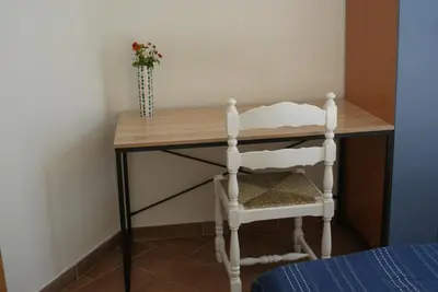 Letto o letti in una camera di Villa Buona Speranza