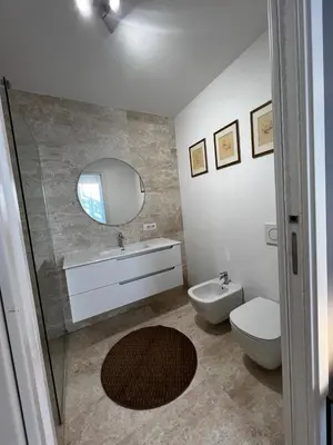 Bagno di Luxury Pisu Apartments