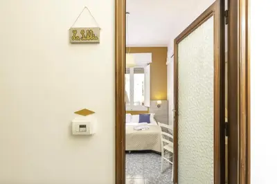 Letto o letti in una camera di Kaliè Rooms Guest House