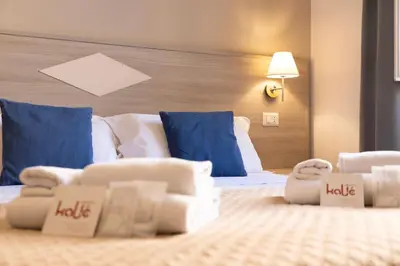 Letto o letti in una camera di Kaliè Rooms Guest House