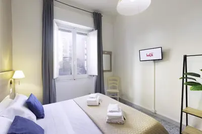 Letto o letti in una camera di Kaliè Rooms Guest House