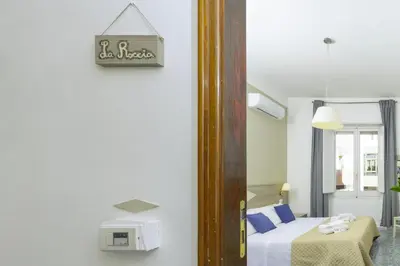 Letto o letti in una camera di Kaliè Rooms Guest House