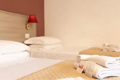 Letto o letti in una camera di Kaliè Rooms Guest House