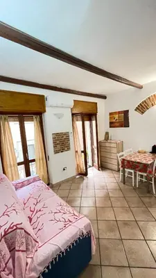 Letto o letti in una camera di Appartamento nel quartiere turistico di Cagliari
