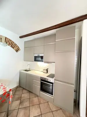 Cucina o angolo cottura di Appartamento nel quartiere turistico di Cagliari