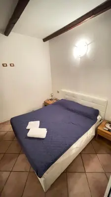 Letto o letti in una camera di Appartamento nel quartiere turistico di Cagliari