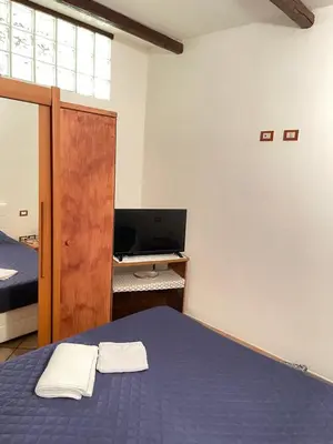 TV o dispositivi per l'intrattenimento presso Appartamento nel quartiere turistico di Cagliari