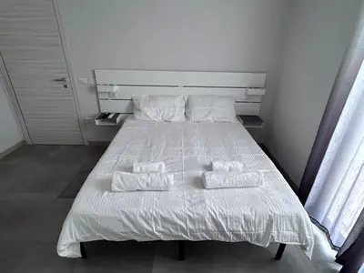 Letto o letti in una camera di Donnicalia