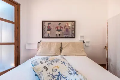 Letto o letti in una camera di Villa Gianna