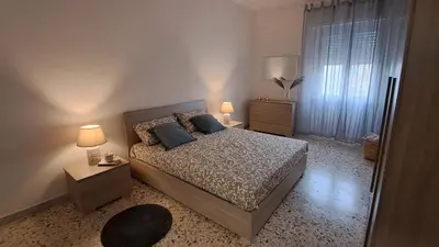 Letto o letti in una camera di GioMarì House
