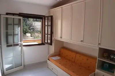Area soggiorno di Casa Pillo Nereidi - 30 m dal mare e con vista mare