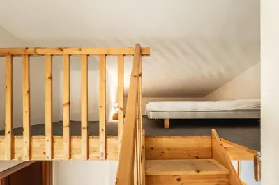 Letto o letti in una camera di Villa Cala Sinzias