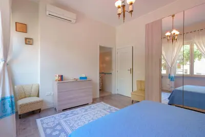 Letto o letti in una camera di Fortyfourbandb
