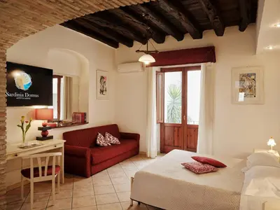 Letto o letti in una camera di Sardinia Domus