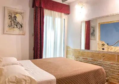 Letto o letti in una camera di Sardinia Domus
