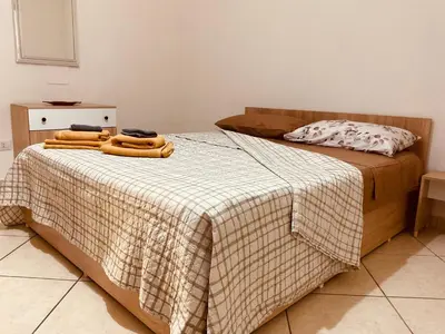 Letto o letti in una camera di Pula Sweet House
