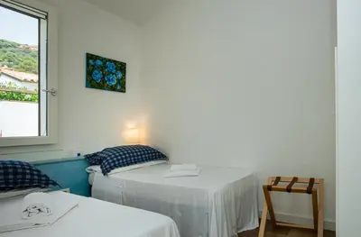 Letto o letti in una camera di Villa Costarei minipiscina