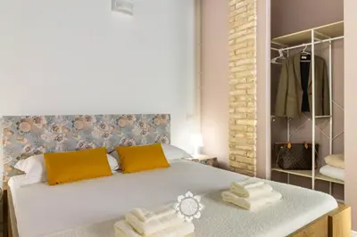Letto o letti in una camera di Domus Ubaldina
