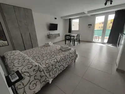Letto o letti in una camera di Casa Vacanze Giginu's Home