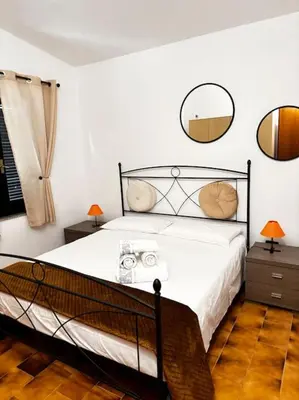 Letto o letti in una camera di Villa Birds