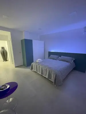 Letto o letti in una camera di Domo Rooms Villacidro