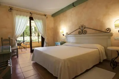 Letto o letti in una camera di Tranquil Lantana Resort Hotel Apartments 1 Bedroom room apartment sleeps 5 per