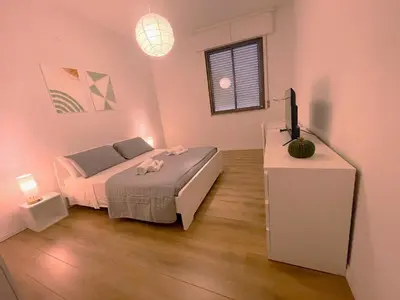 Letto o letti in una camera di Palazzo Tondo Apartment