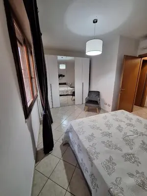 Letto o letti in una camera di CAGLIARI - Appartamento Asfodelo
