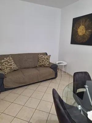 Area soggiorno di CAGLIARI - Appartamento Asfodelo
