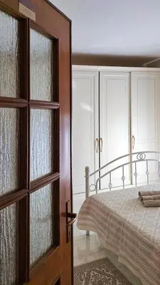 Letto o letti in una camera di B&B Su Presciu
