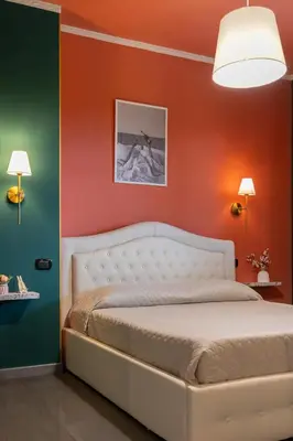 Letto o letti in una camera di XiHouse Bed & Apartments - Iglesias