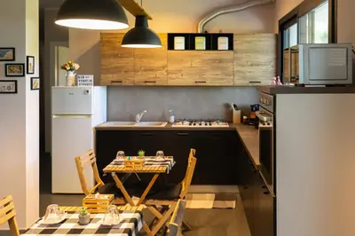 Cucina o angolo cottura di XiHouse Bed & Apartments - Iglesias