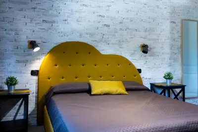 Letto o letti in una camera di XiHouse Bed & Apartments - Iglesias