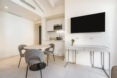 TV o dispositivi per l'intrattenimento presso Karalin Sonnino Suites