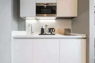 Cucina o angolo cottura di Karalin Sonnino Suites