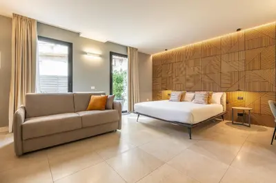Area soggiorno di Karalin Sonnino Suites