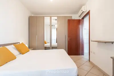 Letto o letti in una camera di Sole e Città by Propertize