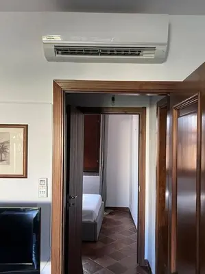 Letto o letti in una camera di Un luogo sospeso nel tempo
