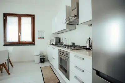 Cucina o angolo cottura di Casa Giunicchi, un gioiello fronte mare