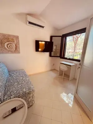 Letto o letti in una camera di Pineta Blu