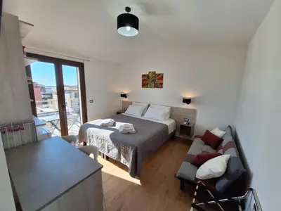 Letto o letti in una camera di COMIDA Guesthouse & Experiences