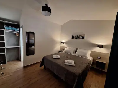 Letto o letti in una camera di COMIDA Guesthouse & Experiences