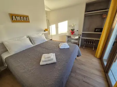 Letto o letti in una camera di COMIDA Guesthouse & Experiences