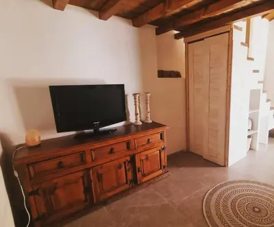 TV o dispositivi per l'intrattenimento presso -Giardino- Vakantiehuis tussen de olijvenbomen
